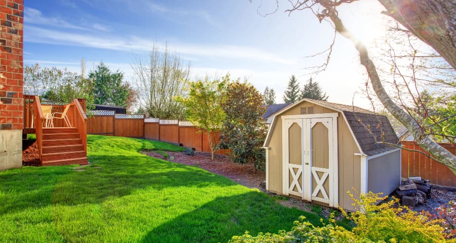 Fenced backyard with storage shed in Boulder